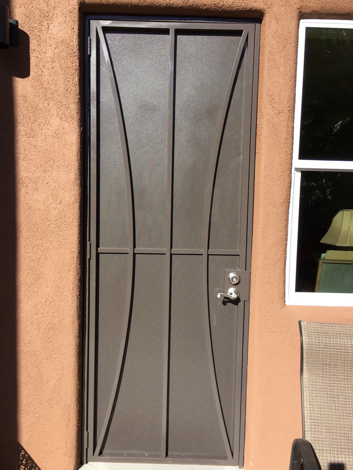 Custom iron security door with glass