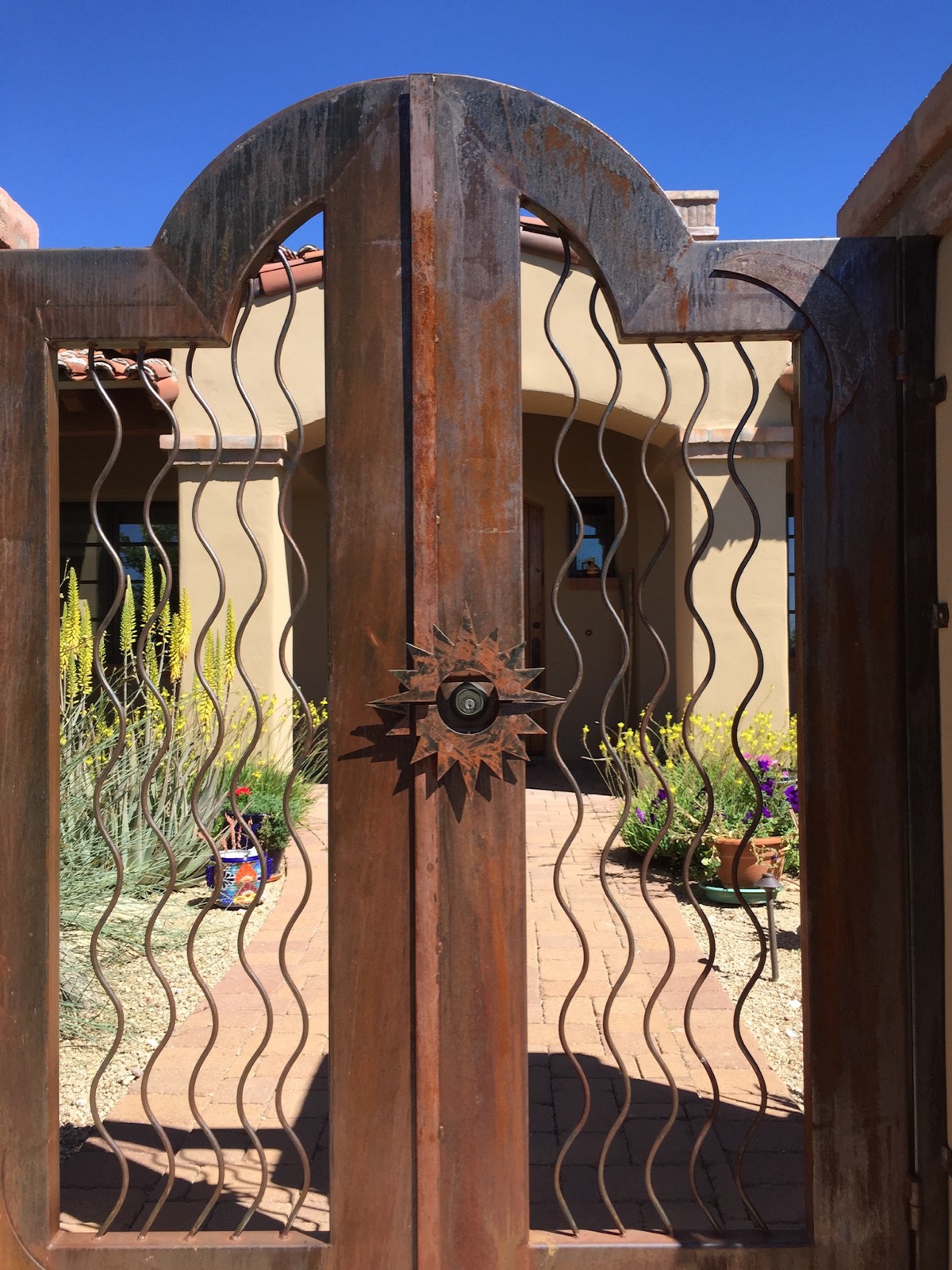 Ornamental iron gate fabricated by STL Manufacturing